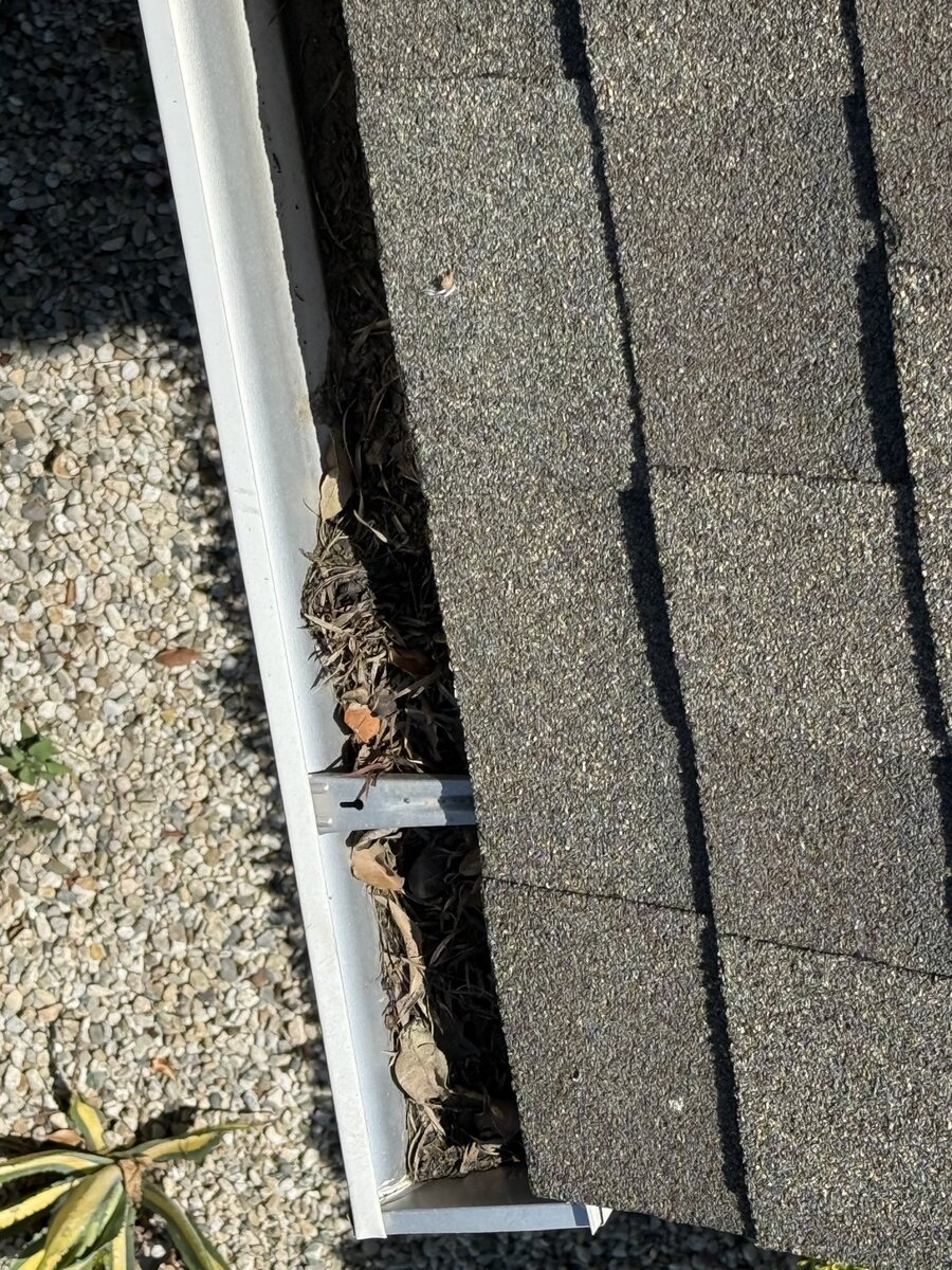 Gutter clearing before cleaning